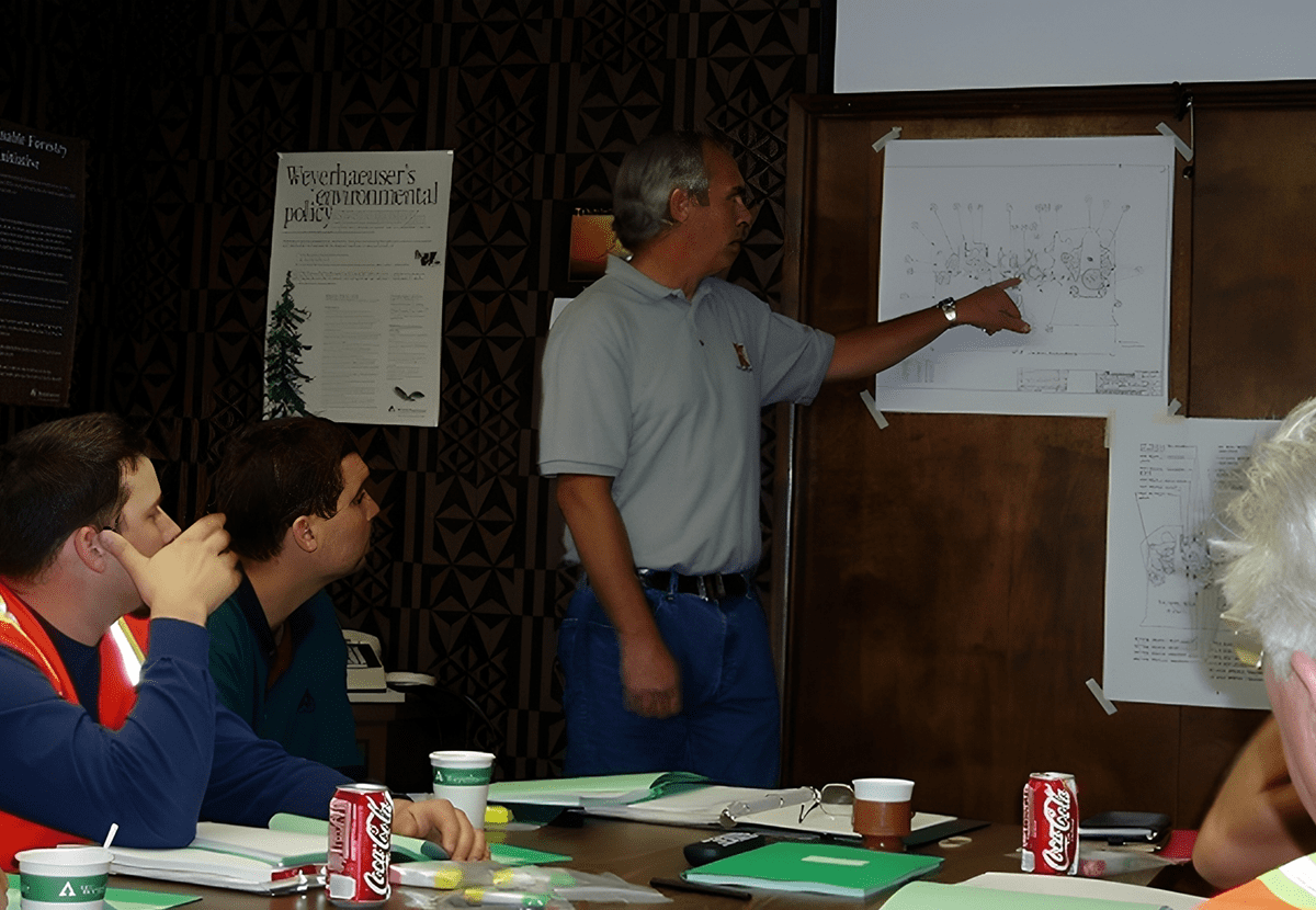 Group engaged in office presentation
